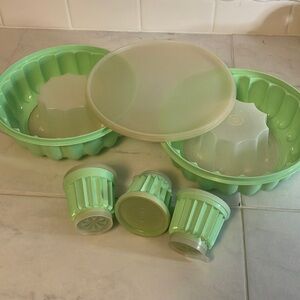 Tupperware 2 green molds / 1 lid.  3 small mold containers.